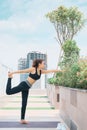 Young asian woman in sport wear doing sports outdoors Royalty Free Stock Photo