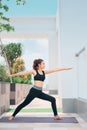 Young asian woman in sport wear doing sports outdoors Royalty Free Stock Photo