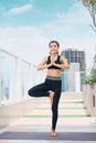 Young asian woman in sport wear doing sports outdoors Royalty Free Stock Photo