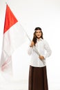 a young asian woman standing grab the indonesian flag