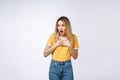 Young Asian woman with surprised excited happy screaming. Cheerful girl with funny joyful face expression Royalty Free Stock Photo