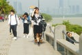 Young asian woman touring in Shenzhen Bay