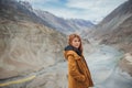 Young asian woman tourist enjoy traveling at confluence of zanskar and indus rivers in leh. Royalty Free Stock Photo