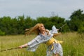 Young asian woman in traditional kimono trains fighting techniques with katana sword Royalty Free Stock Photo