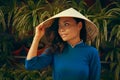 Young asian woman in traditional vietnamese dress ao dai