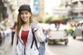 Young asian woman traveler bag backpacker on street at Yaowarat road outdoor market in Bangkok, Thailand Chinatown Royalty Free Stock Photo