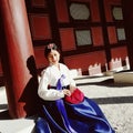 Young asian woman traveler in korean national dress or Hanbok