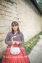 Young asian woman traveler in korean national dress Royalty Free Stock Photo