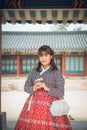 Young asian woman traveler in korean national dress Royalty Free Stock Photo