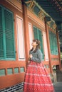 Young asian woman traveler in korean national dress Royalty Free Stock Photo