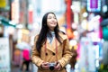 Young asian woman traveler traveling and shopping in Myeongdong street