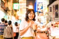 Young Asian Woman Traveler with view at China Town in Bangkok, Thailand