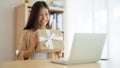 Young asian woman using computer laptop at home Royalty Free Stock Photo