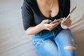 Young asian woman using her cellphone for check in flight and holding passport,money,boarding pass,Selective focus,Travel Vacation Royalty Free Stock Photo