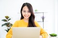 Young asian woman using laptop at house. Work at home, Video conference, Online meeting video call Royalty Free Stock Photo