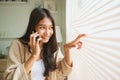 Young asian woman using mobile smartphone Royalty Free Stock Photo