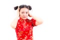 Young Asian woman wearing chinese dress cheongsam with shocked f Royalty Free Stock Photo