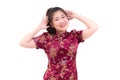 Young asian woman wearing chinese dress traditional cheongsam with gesture of congratulation, Royalty Free Stock Photo