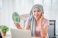 Young asian women wearing hijab Look in the mirror at your desk Represents recovery from a breast cancer illness. breast cancer Royalty Free Stock Photo