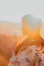 Young Asian woman wearing traditional Japanese kimono and hands holding beautiful white rose. Royalty Free Stock Photo