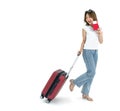 Young asian woman in white t-shirt and jean dragging luggage while holding travel passport and airline ticket. Portrait on white