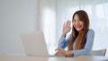 Young asian woman working on computer laptop at house Royalty Free Stock Photo