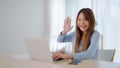 Young asian woman working on computer laptop at house Royalty Free Stock Photo