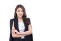 Young Asian working confident business woman who wears black suit and cross arms stands in white office room while working Royalty Free Stock Photo