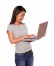 Young asiatic woman using her laptop computer