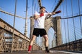 Young athlete fighter exercising on Brooklyn bridge