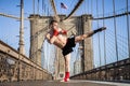 Young athlete fighter exercising on Brooklyn bridge