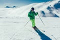 Athlete freestyle Skier having fun while running downhill in beautiful landscape on sunny day during winter season Royalty Free Stock Photo