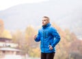 Young athlete in park running in colorful autumn nature Royalty Free Stock Photo