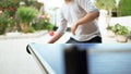 Young athlete sportsman playing table tennis outdoor during quarantine because of COVID 19, coronavirus