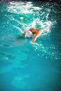 Young athlete swimmer recreating on outdoor