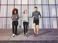 Young athletes going down outdoors on city stairs Royalty Free Stock Photo