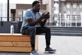 Man Listening to Music in City Royalty Free Stock Photo