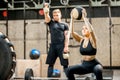 Couple training in the crossfit gym