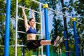 Athletic female on sport playground