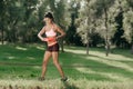 Young athletic girl playing ultimate frisbee. Sport Concept. Royalty Free Stock Photo