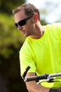 Young athletic man on bicycle