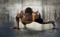 Young athletic man doing push-ups. Royalty Free Stock Photo