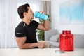 Young athletic man drinking protein shake Royalty Free Stock Photo