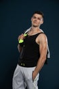 An athlete shows off his muscles by flexing his arm muscles after a competition. Royalty Free Stock Photo