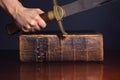 Young Athletic Man with His Bible and Sword Royalty Free Stock Photo