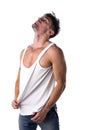 Young athletic man pulling down tanktop Royalty Free Stock Photo