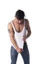 Young athletic man pulling down tanktop Royalty Free Stock Photo