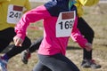 Young athletic runners on a race. Outdoor circuit