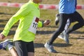 Young athletic runners on a race. Outdoor circuit.