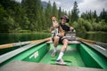 Traveller man with best friend dog on boat Royalty Free Stock Photo